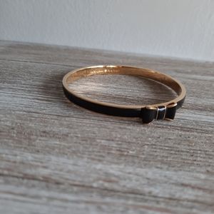 Kate Spade "take a bow" black and gold bangle